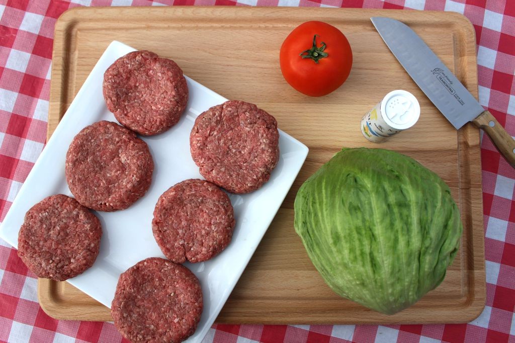 Burger Grilling: Learn how to grill perfect hamburgers with the 5-6-7 Grilled Burger Method. These foolproof tips for buying, mixing, shaping, and grilling your backyard burgers are fool proof.