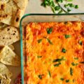 This Broccoli Cheddar Dip is warm, decadent, and creamy! It is everything you love about broccoli cheese soup, but in a dip!