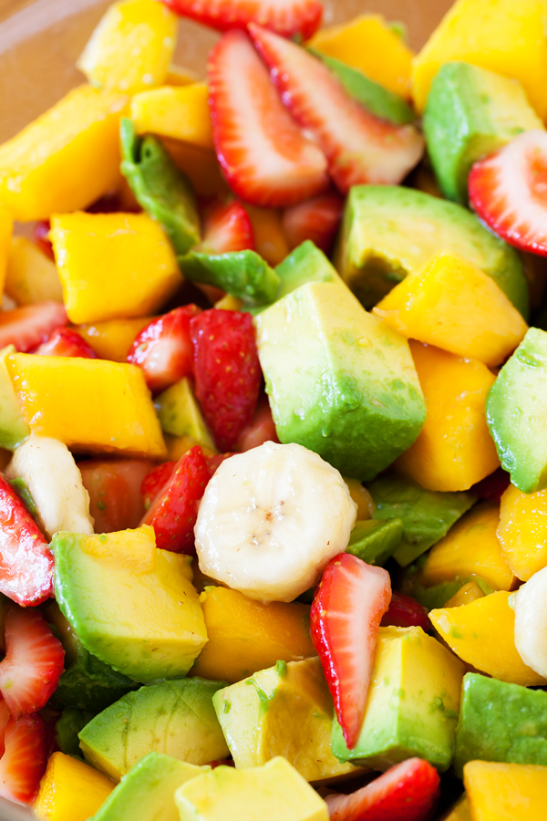 The PKP Way | This colorful and inviting Strawberry & Avocado Summer Fruit Salad is a refreshing summer snack that will help you maintain that bikini body you’ve been working diligently to achieve.