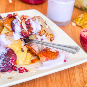 Honey Broiled Fruit with Almonds and Pomegranate Coconut Crema