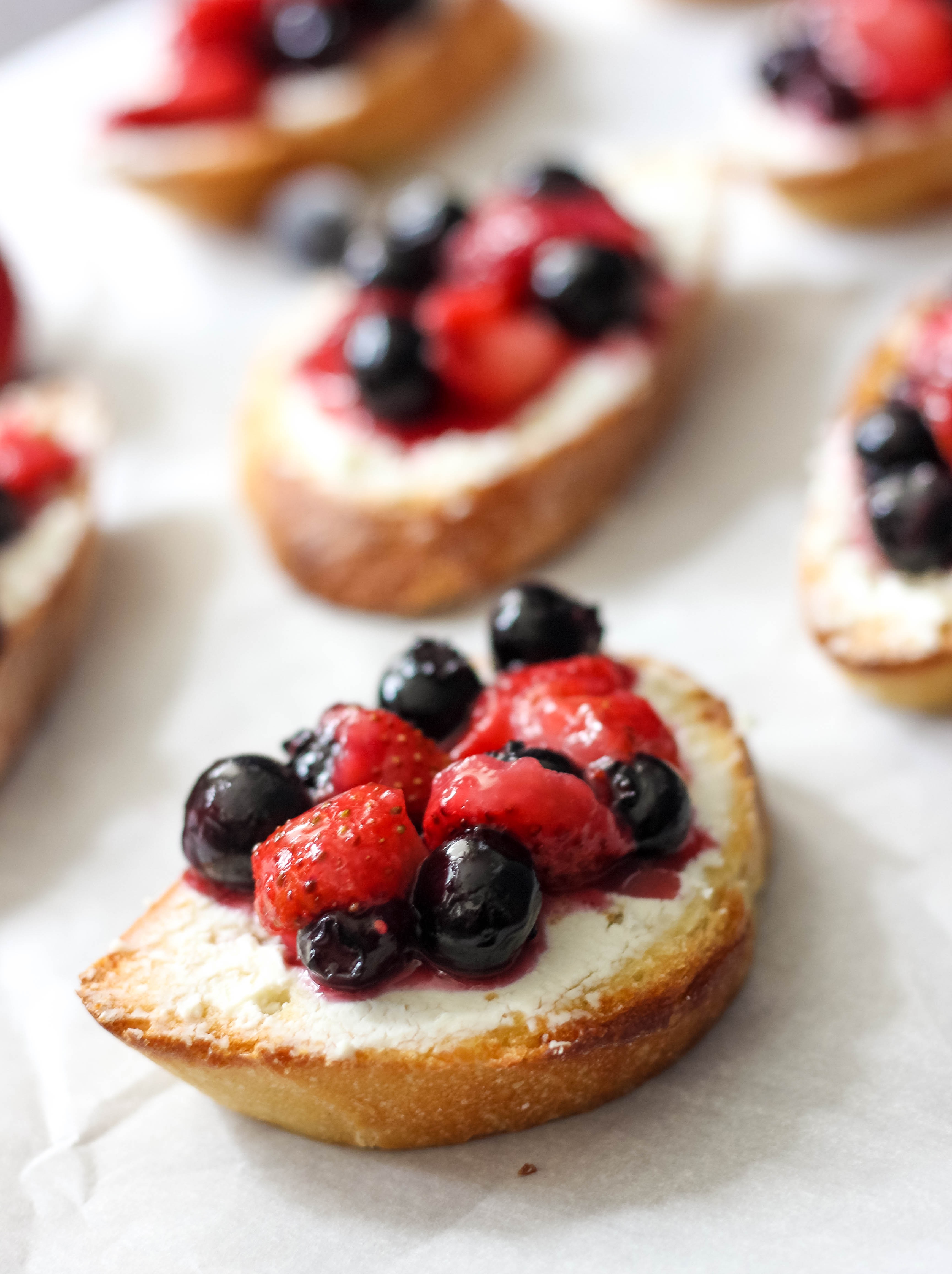 These sweet and savory Crostini with Goat Cheese and Honey Caramelized Berries will quickly become your favorite appetizer for any of your get-togethers.