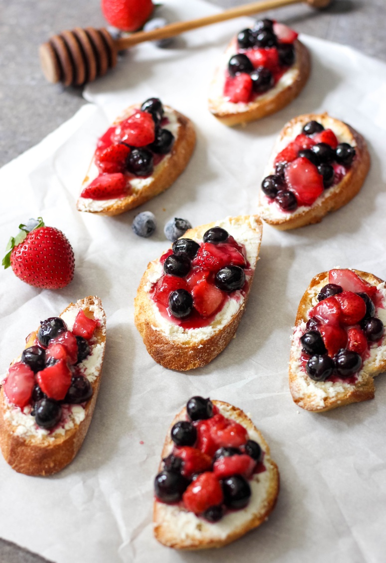 These sweet and savory Crostini with Goat Cheese and Honey Caramelized Berries will quickly become your favorite appetizer for any of your get-togethers.