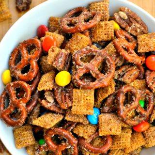 Cinnamon Sugar Snack Mix is perfect for satisfying your snack time cravings! Pretzels, pecans, candy, and cereal coated in cinnamon sugar make this mix so indulgent!
