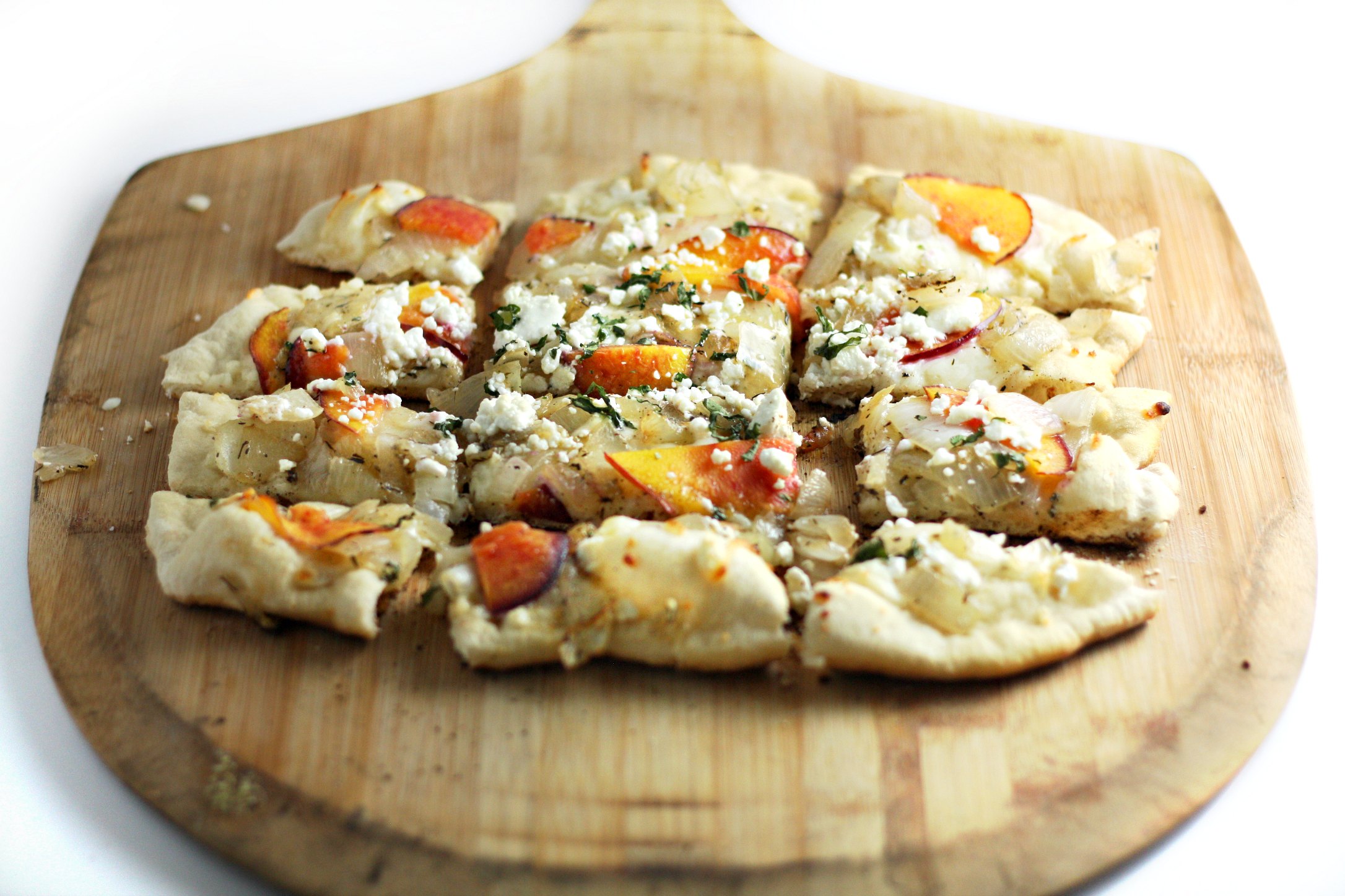 grilled peach and goat cheese pizza