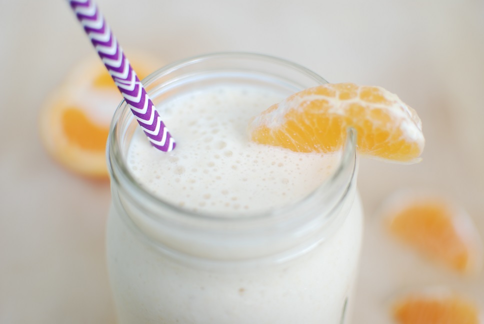This Orange Dreamsicle Smoothie recipe brings your favorite summer flavors into a healthy smoothie that packs in 10 grams of protein per serving!