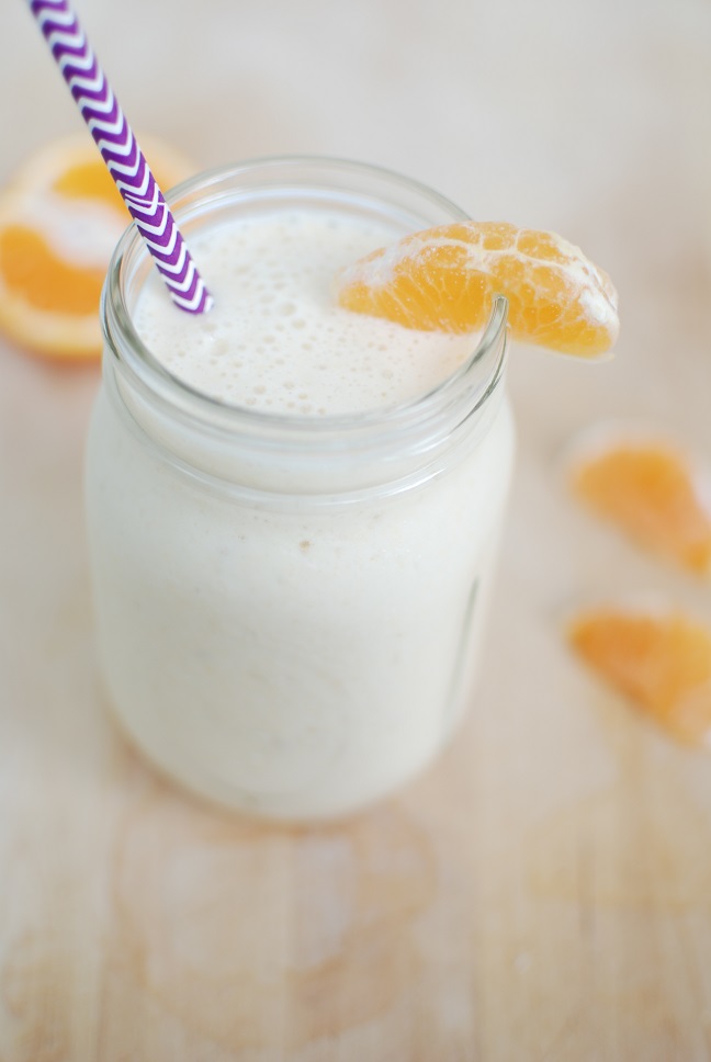 This Orange Dreamsicle Smoothie recipe brings your favorite summer flavors into a healthy smoothie that packs in 10 grams of protein per serving!