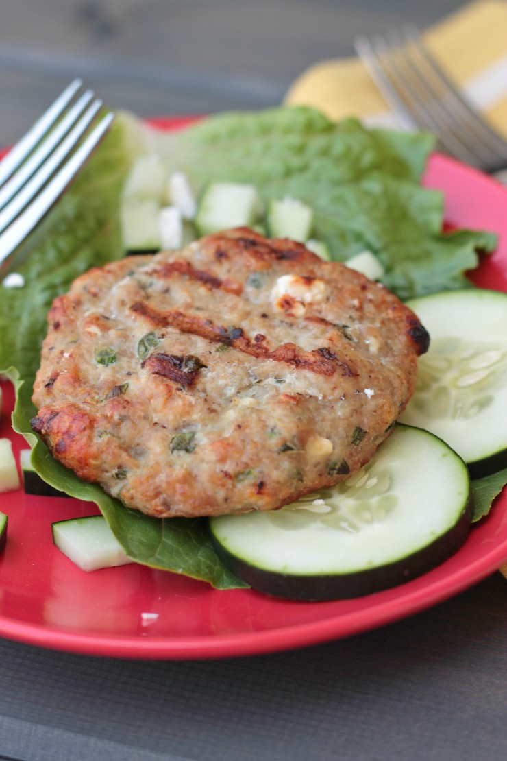 Greek turkey burgers!! So lean, so juicy, so delicious! Omit the feta for a paleo burger or keep it in for an awesome flavor addition. Either way, these are clean, healthy, and will knock your socks off!