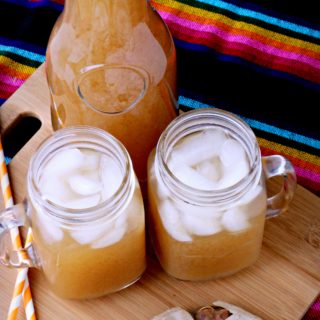 Learn how to make authentic Mexican Agua Fresca de Tamarindo, aka Tamarindo Drink. Made with tamarind pods, this soda alternative is a refreshing sweet and sour 3-ingredient drink full of vitamins and minerals.
