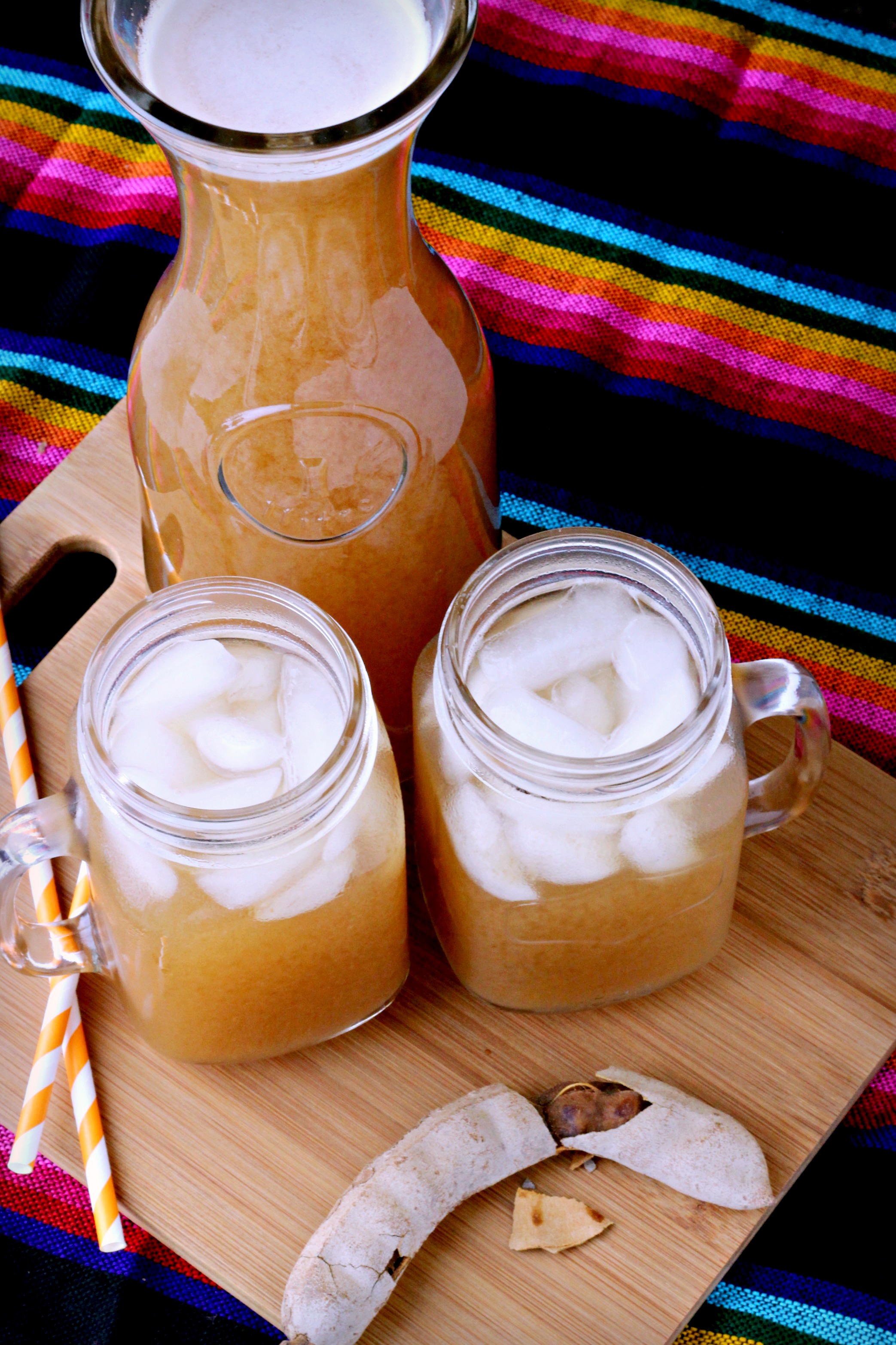 Learn how to make authentic Mexican Agua Fresca de Tamarindo, aka Tamarindo Drink. Made with tamarind pods, this soda alternative is a refreshing sweet and sour 3-ingredient drink full of vitamins and minerals.