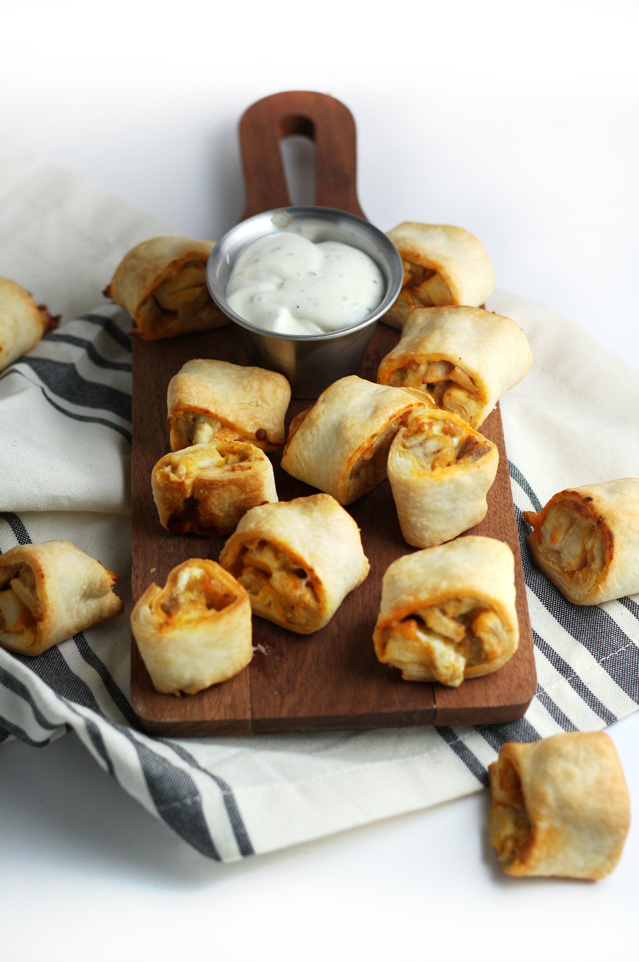 These flavorful Buffalo Chicken Blue Cheese Bites are the perfect party appetizer for entertaining. Whether you’re hosting a tailgate party or happy hour at home, these budget-friendly small bites need to be on the menu.