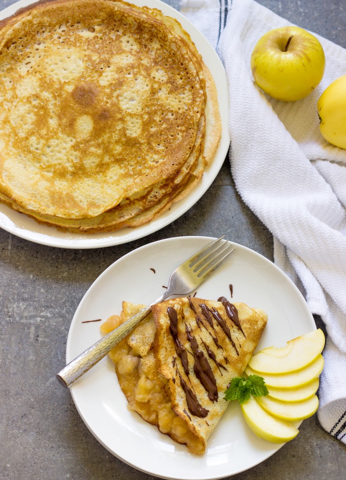 These delicate Crepes With Homemade Apple Banana Jam And Chocolate Sauce are easy to prepare and perfect for make-ahead breakfast. 
