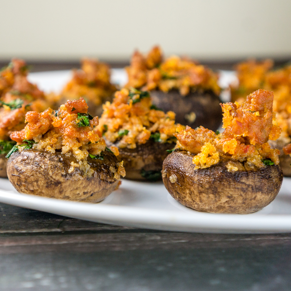 These Dairy Free Sausage Stuffed Mushrooms are the perfect appetizer with their spicy, meaty filling. Serve this to your guests and this will be the recipe everyone will ask you about!