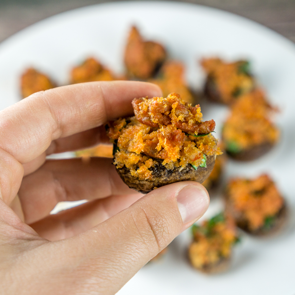 These Dairy-Free Sausage Stuffed Mushrooms are the perfect appetizer with their spicy, meaty filling. Serve this to your guests and this will be the recipe everyone will ask you about!