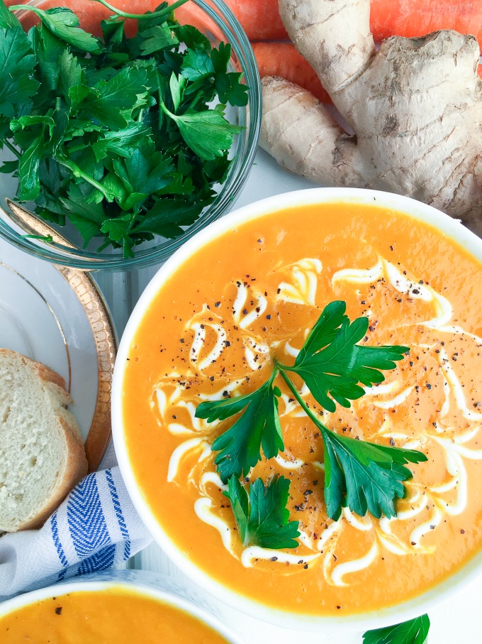 This 30-Minute Carrot Ginger Soup is pure comfort food full of all of your favorite fall flavors. This cheap healthy meal is the perfect quick weeknight dinner.
