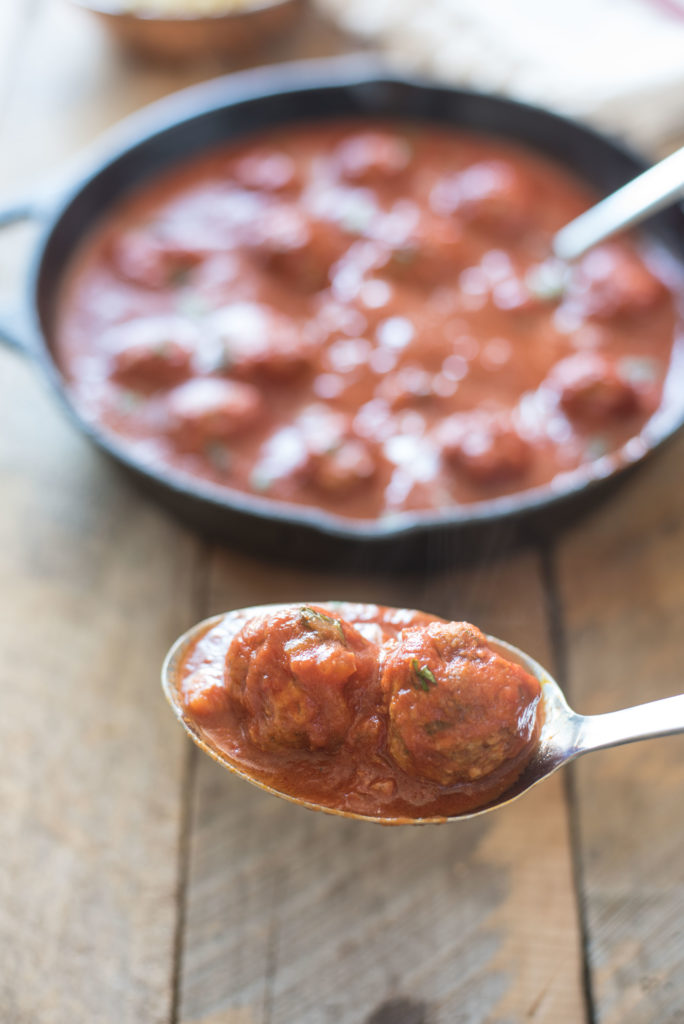 Moroccan Meatballs with mint, cilantro, and spices cooked in a Spicy Tomato Sauce Moroccan Meatballs with all the flavors of North African cuisine. A delicious and hearty one-pan meal.