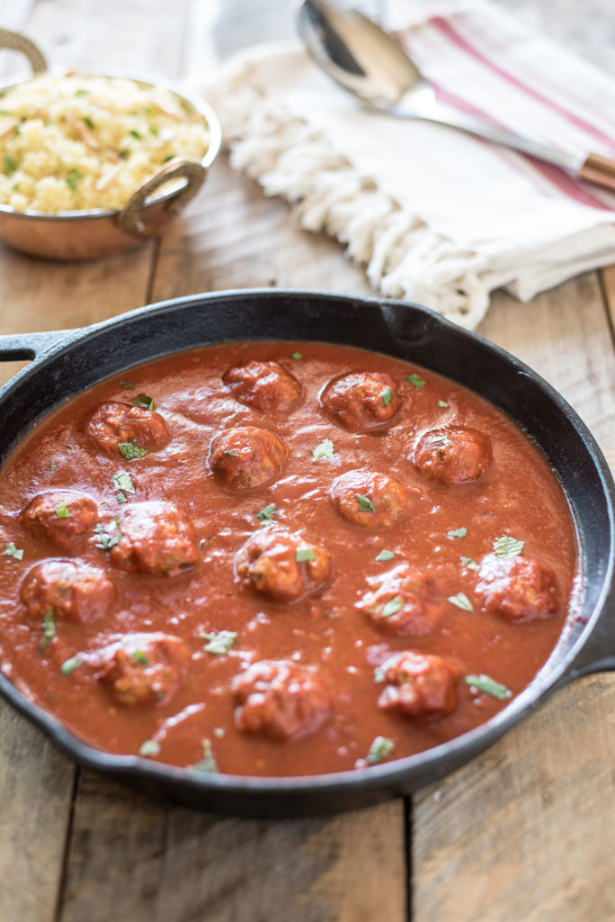 Moroccan Meatballs with mint, cilantro, and spices cooked in a Spicy Tomato Sauce Moroccan Meatballs with all the flavors of North African cuisine. A delicious and hearty one-pan meal.