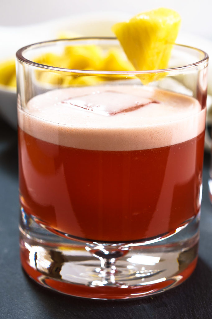 This Tropical Americano Cocktail is just as pretty as it is delicious. It's perfect for a quite after dinner drink or celebrating a special occasion. | HostessAtHeart.com