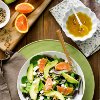 Enjoy a cheap healthy dinner when you make this farmers market fresh Citrus Avocado Salad with Turmeric Dressing. This summer salad is the perfect light lunch of dinner.