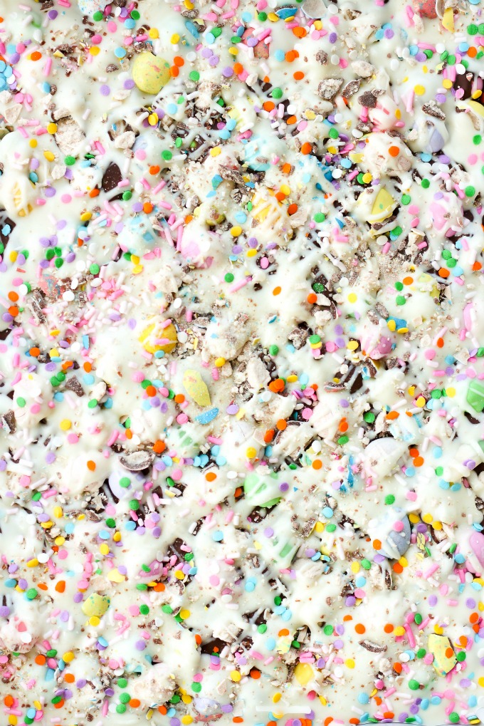 This festive holiday Bunny Bark recipe is full of semi sweet chocolate, Easter candy, white chocolate, and colorful sprinkles; just in time for spring.