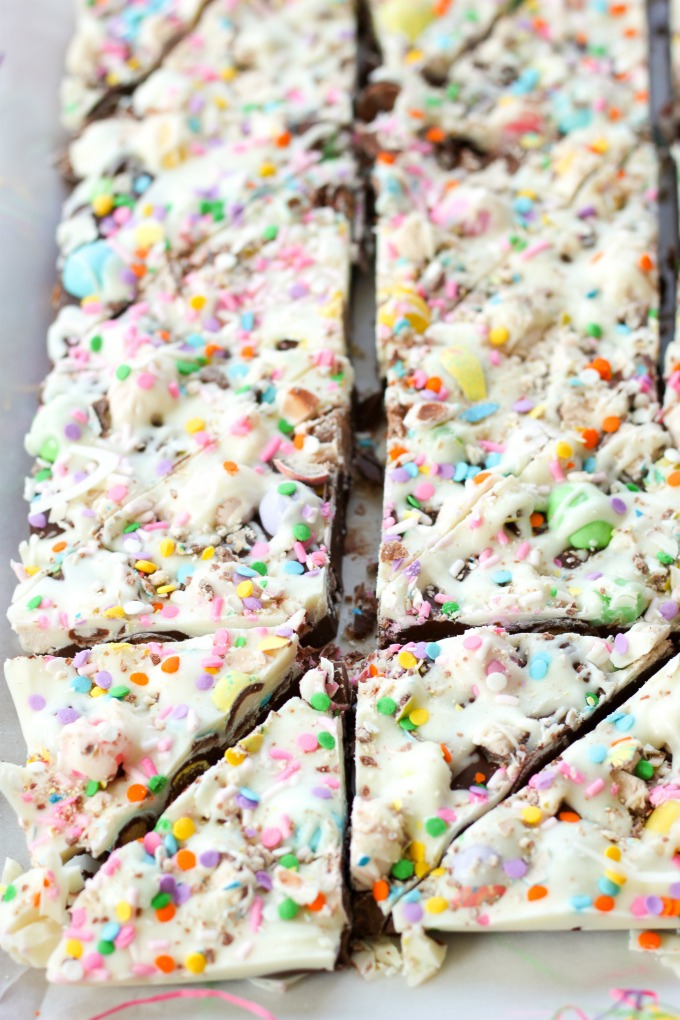 This festive holiday Bunny Bark recipe is full of semi sweet chocolate, Easter candy, white chocolate, and colorful sprinkles; just in time for spring.