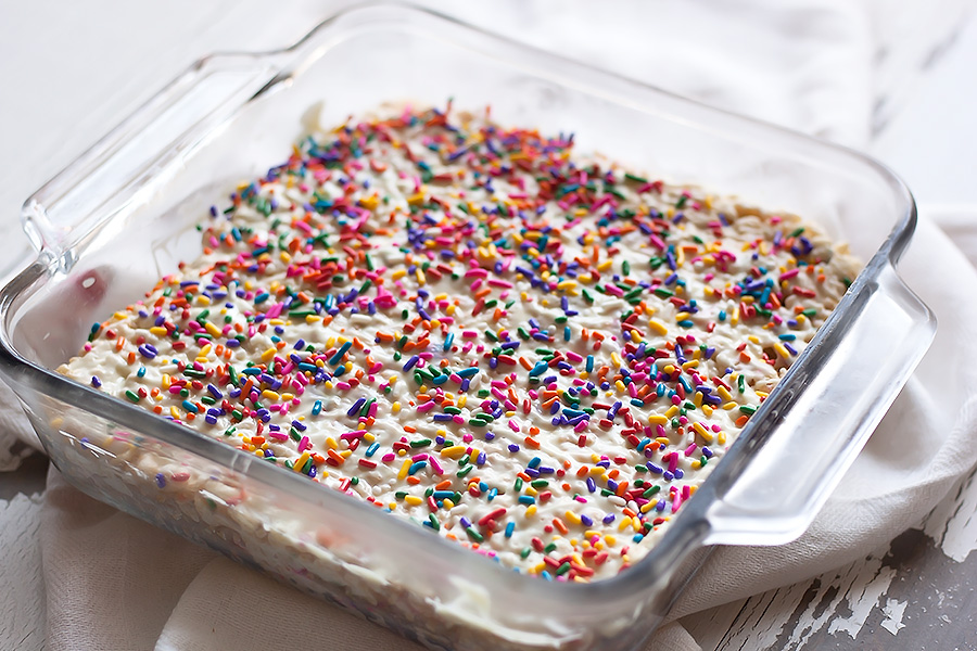 These blissful White Chocolate Rice Cereal Treats elevate a classic family recipe by adding elegant white chocolate and a generous amount of spring-inspired sprinkles.