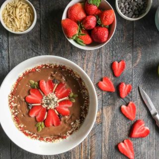 This healthy Chocolate Strawberry Smoothie Bowl made with avocado, almond milk, and chocolate protein powder is so creamy and decadent, it's hard to believe that it's good for you too!