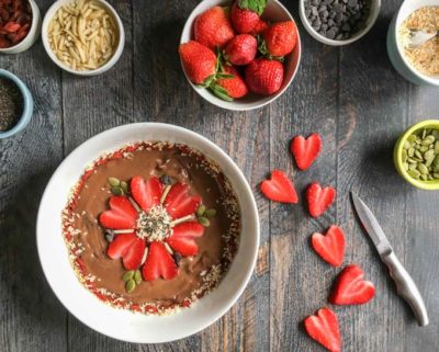 This healthy Chocolate Strawberry Smoothie Bowl made with avocado, almond milk, and chocolate protein powder is so creamy and decadent, it's hard to believe that it's good for you too!