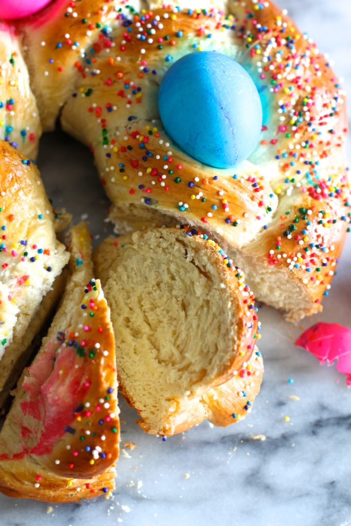 Your family will love to see this festive Pane Di Pasqua on your holiday brunch table; sweet Italian Easter bread baskets with colorful eggs woven in.