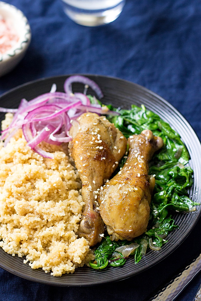 You're going to love this delicious, healthy, and flavorful Braised Chicken Couscous and Spinach recipe. With very little fuss and just one pan, this is the perfect simple and nutritious weeknight meal!