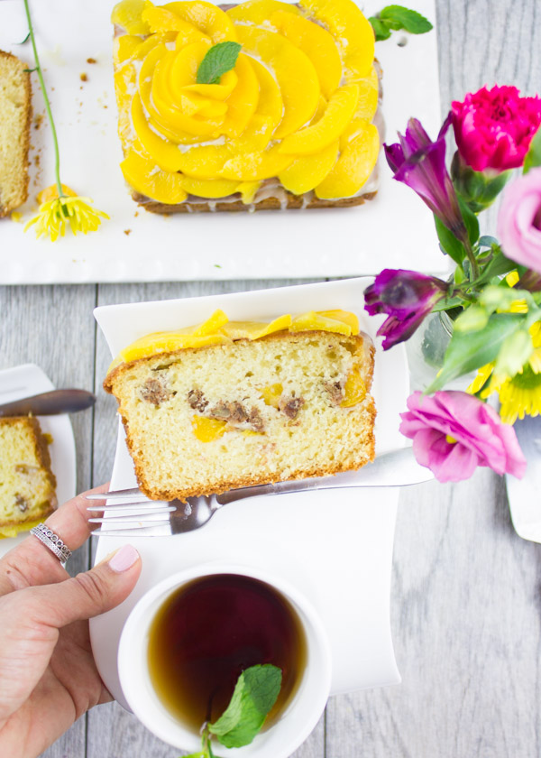 Treat your favorite Mom this Mother's Day by making this Peach Cinnamon Pecan Loaf Cake. Perfect for brunch, this delightful cake is full of flavor.