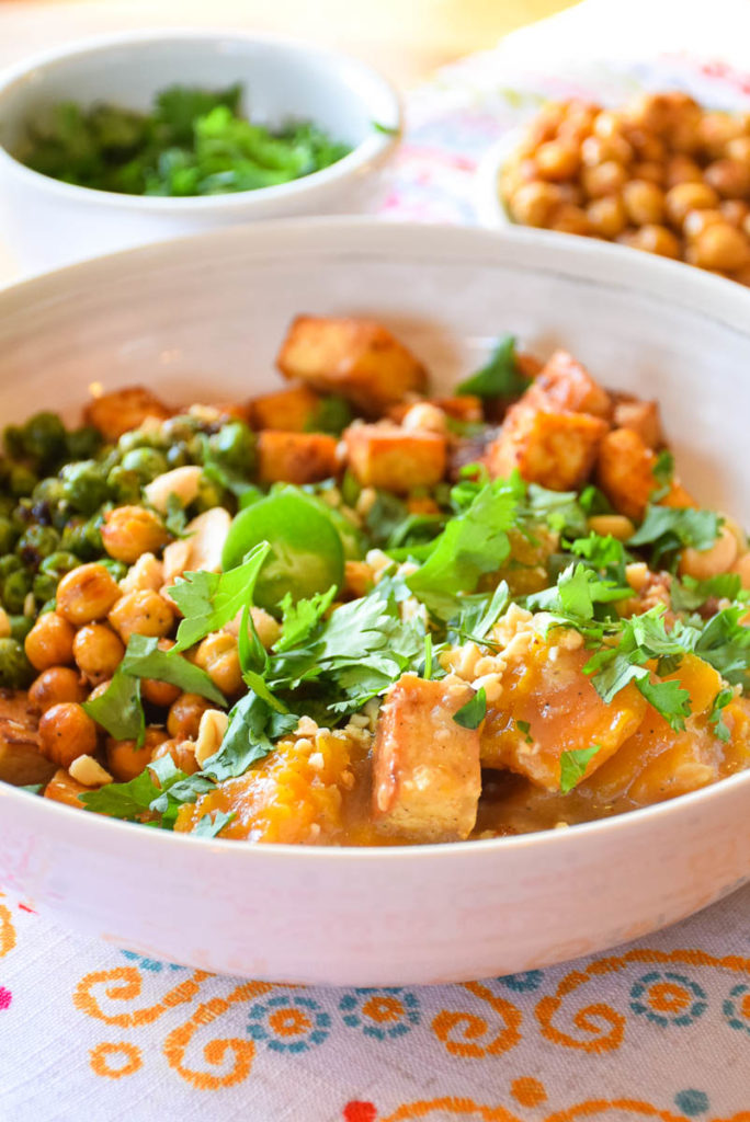 Coconut Curry Tofu Bowl is a vegetarian meal that brings pleasure to all of your senses! Crispy, creamy comfort combined with a slightly sweet heat. A perfect meal to serve your family for that night when you want to make a meatless option.