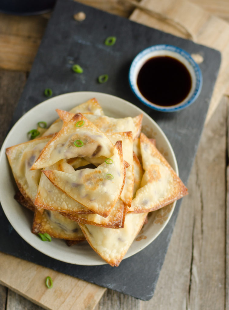 You'll want to pick up colorful rainbow carrots, purple cabbage, green onions, and more at your local farmers market to make these Vegetarian Crispy Baked Wontons for lunch, dinner, snacks, or spring and summer parties.