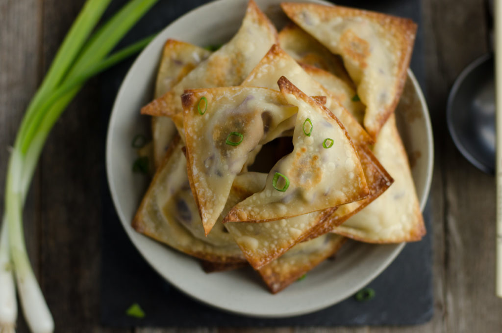 You'll want to pick up colorful rainbow carrots, purple cabbage, green onions, and more at your local farmers market to make these Vegetarian Crispy Baked Wontons for lunch, dinner, snacks, or spring and summer parties.