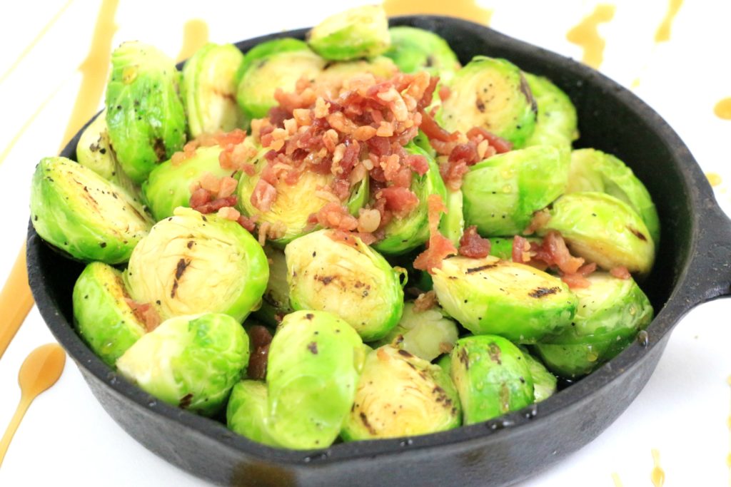 These Grilled Maple Bacon Brussels Sprouts are going to change the way you think about those tiny green cabbages. Sweet and salty with a little flavor from the grill makes these brussels sprouts a delicious appetizer.