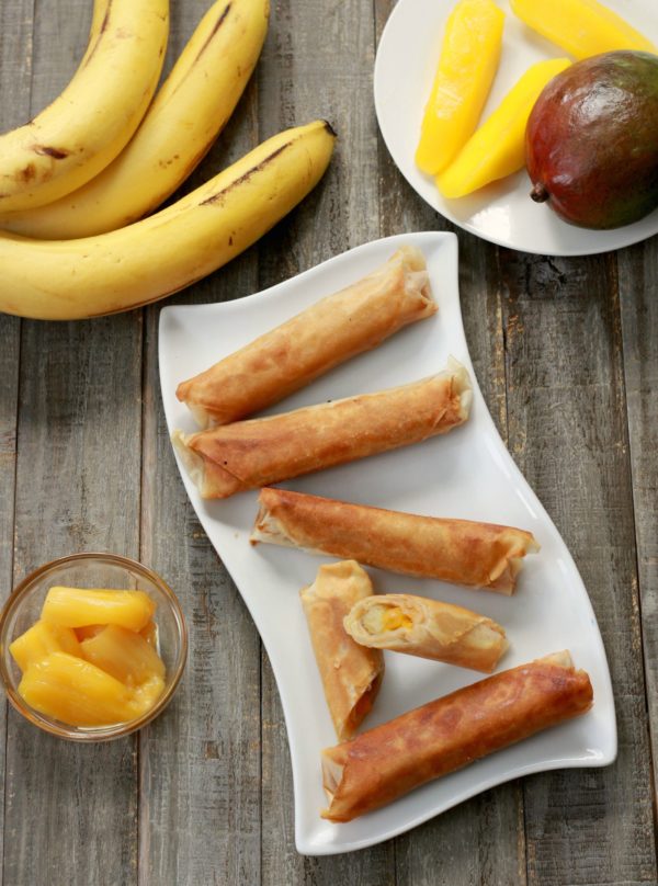 Perfectly crunchy on the outside, sweet and gooey on the inside, these Mixed Fruit Spring Rolls (Lumpia) are a perfect dessert option. Since they're baked not fried, you can enjoy with a scoop of ice cream, without the guilt.