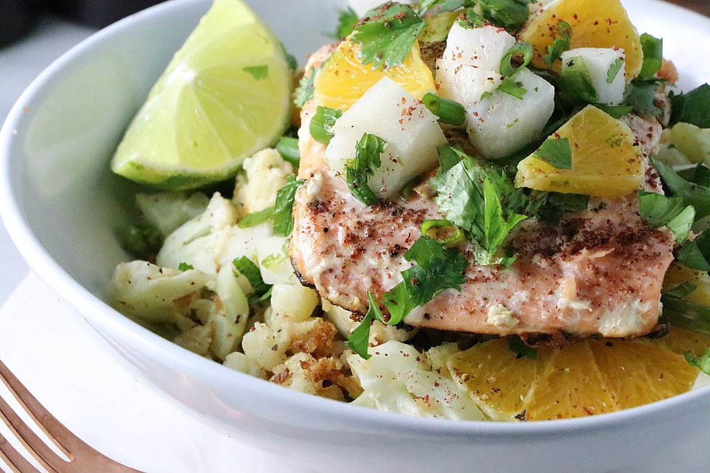 If you love effortless spring-inspired dishes, you need to try this recipe for Pan-Seared Citrus Salmon! Paired with cauliflower rice and seasoned with the fresh flavors of spring, this healthy dish is a must try.