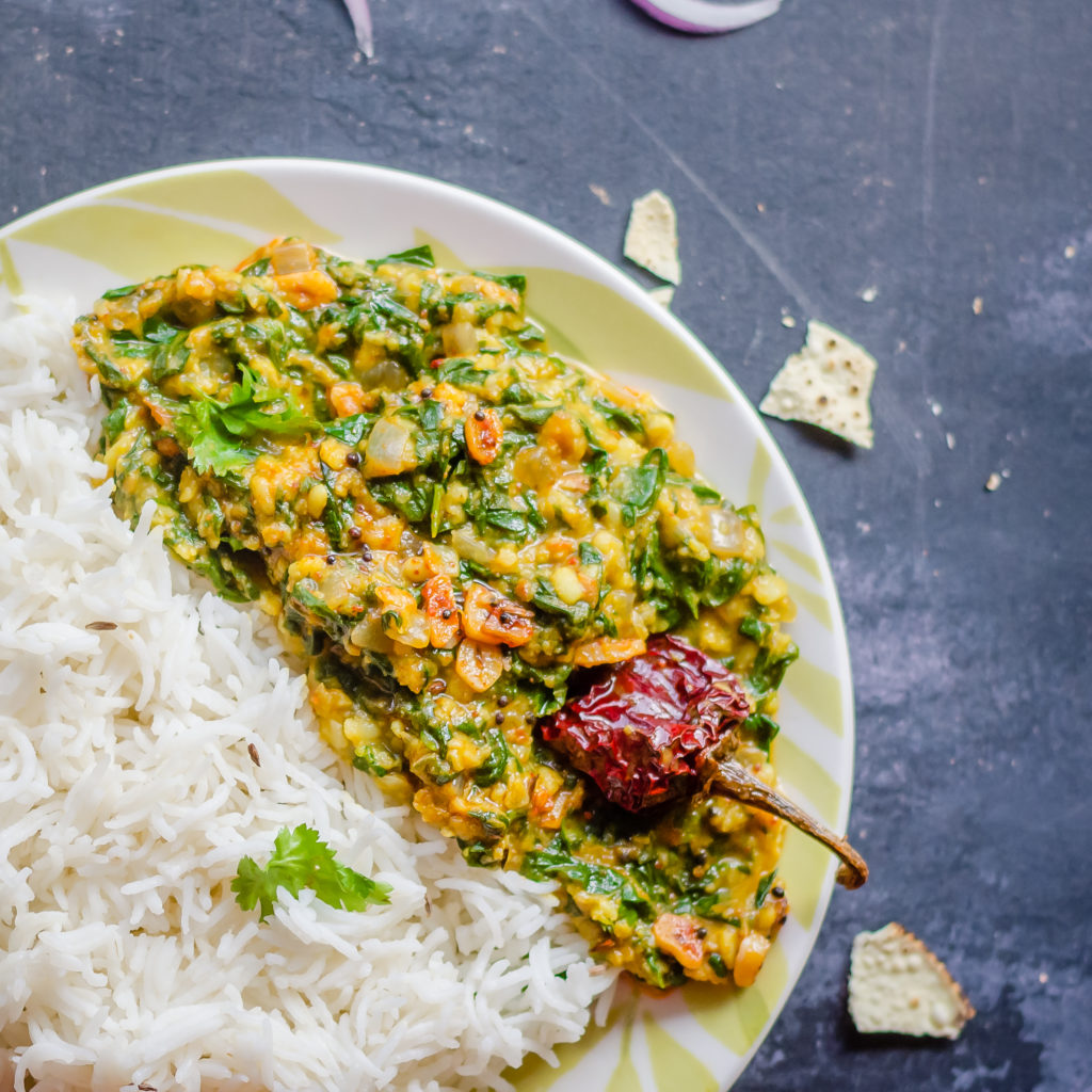 This Indian-Style Vegan Spinach Lentil Curry is delicious comfort food perfect for a weeknight meal. This vegetarian dinner is a cheap healthy meal ready in 30 minutes.