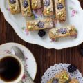 Financiers are traditional bite-sized French treats. Made with pistachio and almond flour, these French Financiers with Blackberries are an attractive dessert that's a melt-in-your mouth delight.