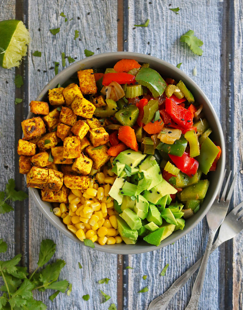 This Spiced Tofu Veggie Buddha Bowl is super easy to pull together and an array of spices ensure that this bowl is super tasty too. This mix of beautiful colors and vibrant flavors is divine!