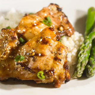 Enjoy a delicious summer barbecue with Grilled Soy Garlic Chicken Thighs. With an Asian flair and sesame seeds on top this poultry does not disappoint.