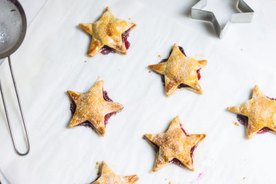 While Memorial Day is often celebrated with a good barbecue fest, some of the best feasting can actually happen over dessert. These Star-Shaped Hand Pies are one of the most delicious ways to show your patriotism and satisfy your sweet tooth!