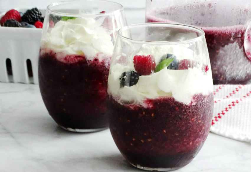 These Very Berry Wine Slushies are a fun adult twist on the fruit slushies you enjoyed as a kid. Made with fresh berries, Merlot, and frozen fruit juice, you'll be sipping on these refreshing berry wine slushies all summer long!