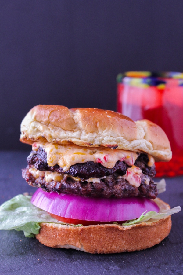 Surprise dad this Father's Day with these mouthwatering Grilled Pimento Cheeseburgers! Made with homemade pimento cheese spread, these delicious burgers are perfect for any celebration.