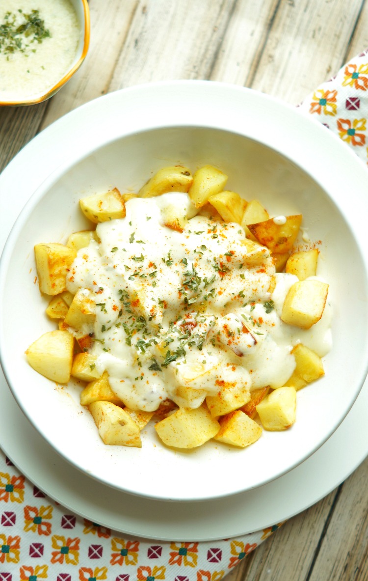 Oven Fried Spanish Potatoes with Aioli are an easy and delicious take on the classic Spanish tapa, Patatas Aioli. You'll love this awesome side dish!