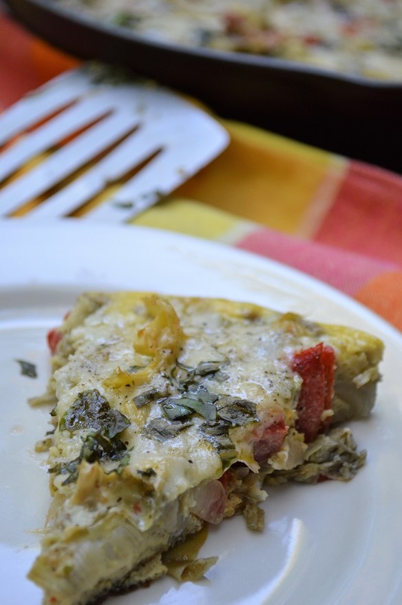 Whip up this One-Pan Artichoke Roasted Red Pepper Frittata recipe first thing in the morning for an easy-to-make breakfast or enjoy it at the end of the day as a breakfast-for-dinner treat you can't resist.