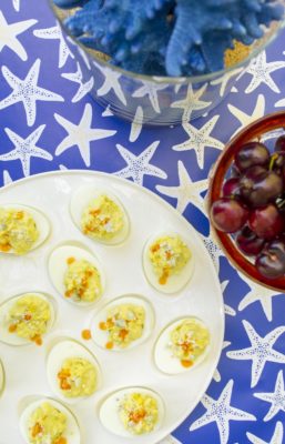 Show your patriotic pride at your next outdoor gathering when you make this simple and unique Red, White, and Bleu Deviled Eggs recipe. Adding savory mix ins to traditional deviled eggs makes them even more special for the holidays!