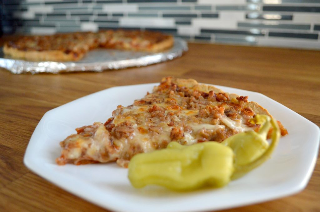 Love pizza, but you're trying to eat clean? This Real Clean Eating Homemade Pizza recipe is the answer! Made with only fresh farmers market finds and a seasoned, no-yeast crust, you may never order takeout again.