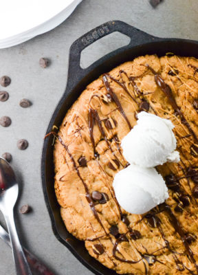 If you have been searching for a tasty, vegan, and gluten-free dessert to share with friends, stop right now! This GF Stuffed Chocolate Chip Cookie Skillet full of peanut butter and chia seeds has your name written all over it.