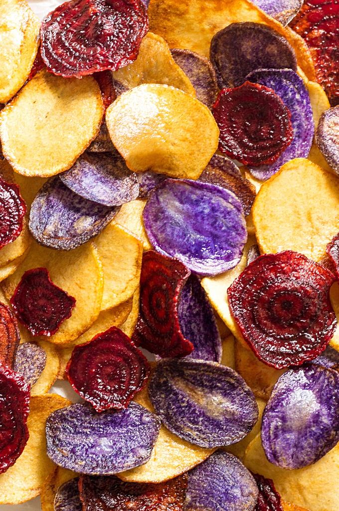 These Crispy Beet Chips and Potato Chips are a simple and healthy alternative to store-bought chips. With bold, bright colors and fresh veggie flavors, these chips are a sure-fire hit this summer!