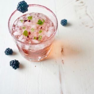 Enjoy the fresh flavors of summer while you wind down after a busy day when you make this simple Blackberry Mint Vodka Splash Cocktail with fresh farmers market finds!